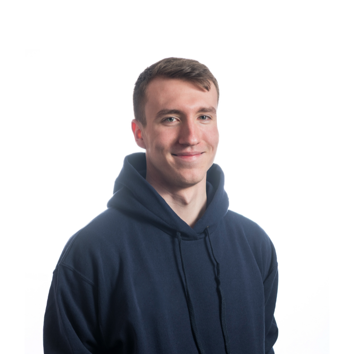 Adam Davies, founder of SimpliDev, in a blue hoodie with white background - web designer in Caerphilly